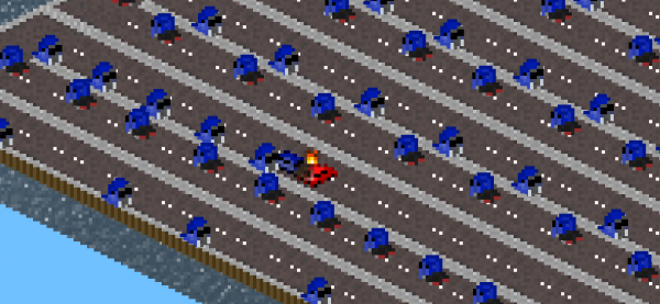 a red car appears in a field of blue trucks...